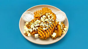 1/2 POUND GREEK FETA FRIES w/ 2 SIDES OF TZATZIKI